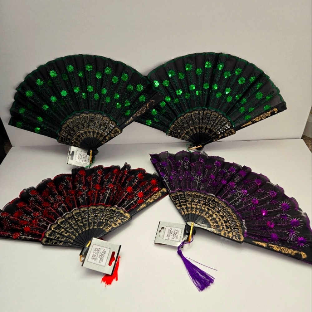 Set of 4 handheld foldable fans. Great for Halloween